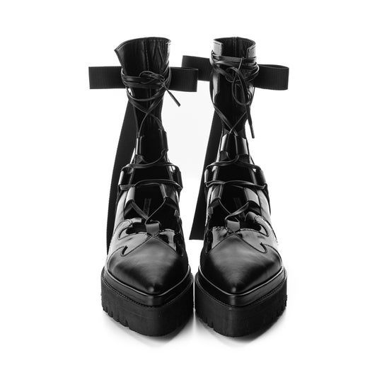 Modern black leather boots