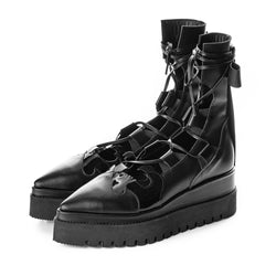 Black leather trendy lace-up boot with stylish patent leather elements