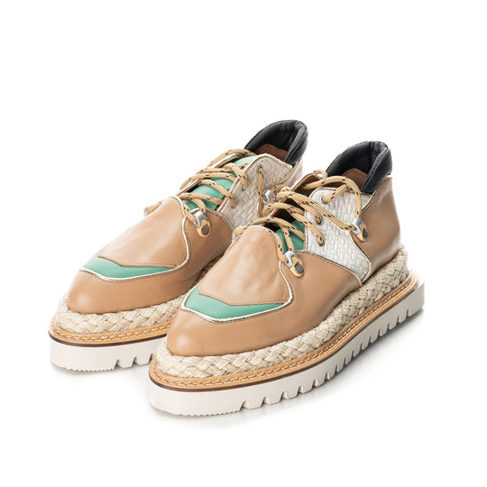 Beige leather flat shoes with light green and white textured leather details