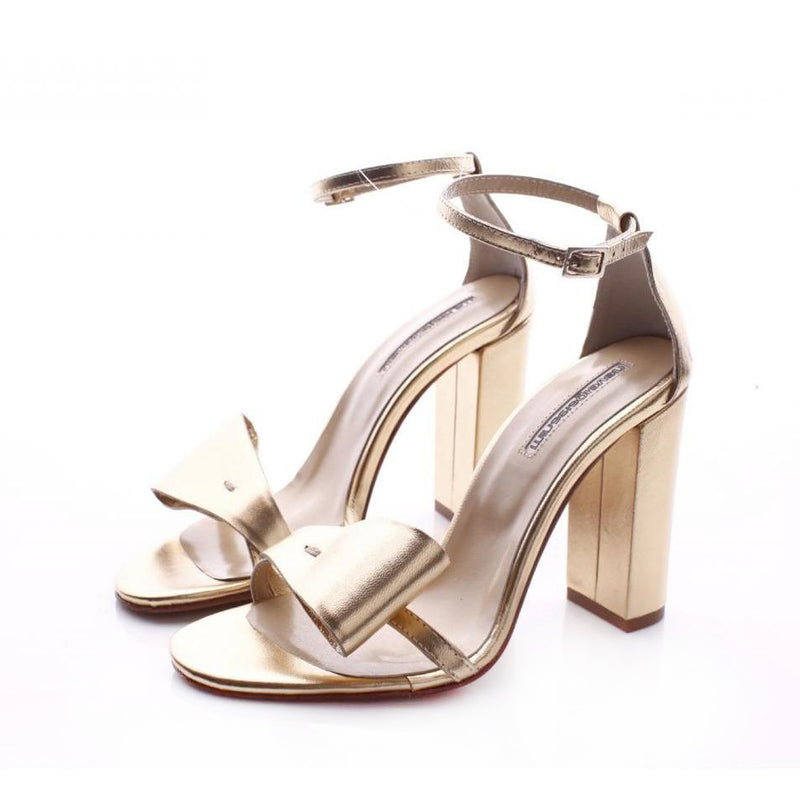Take a Bow Golden leather  Sandals
